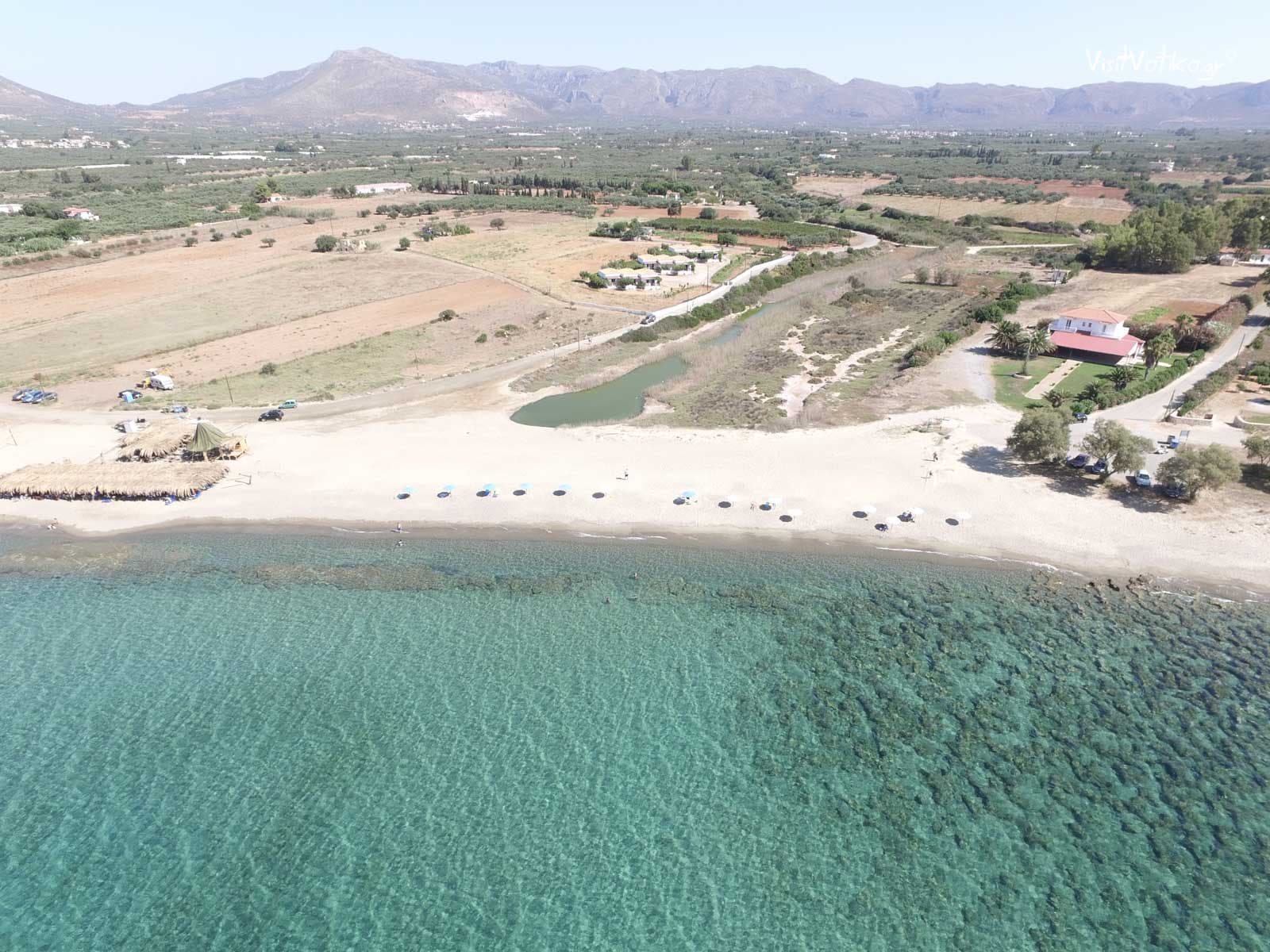 Neratziona Beach with umbrellas and sunbeds