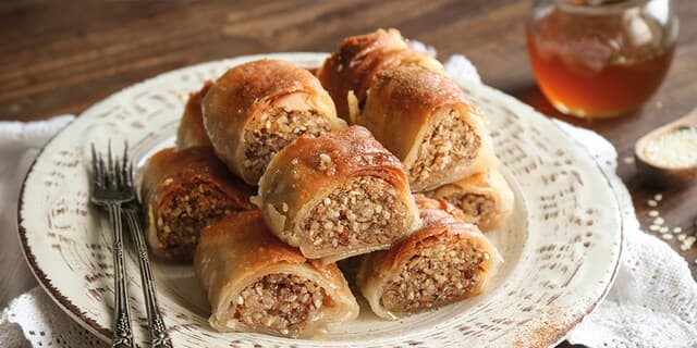 Local pastries like Samousades