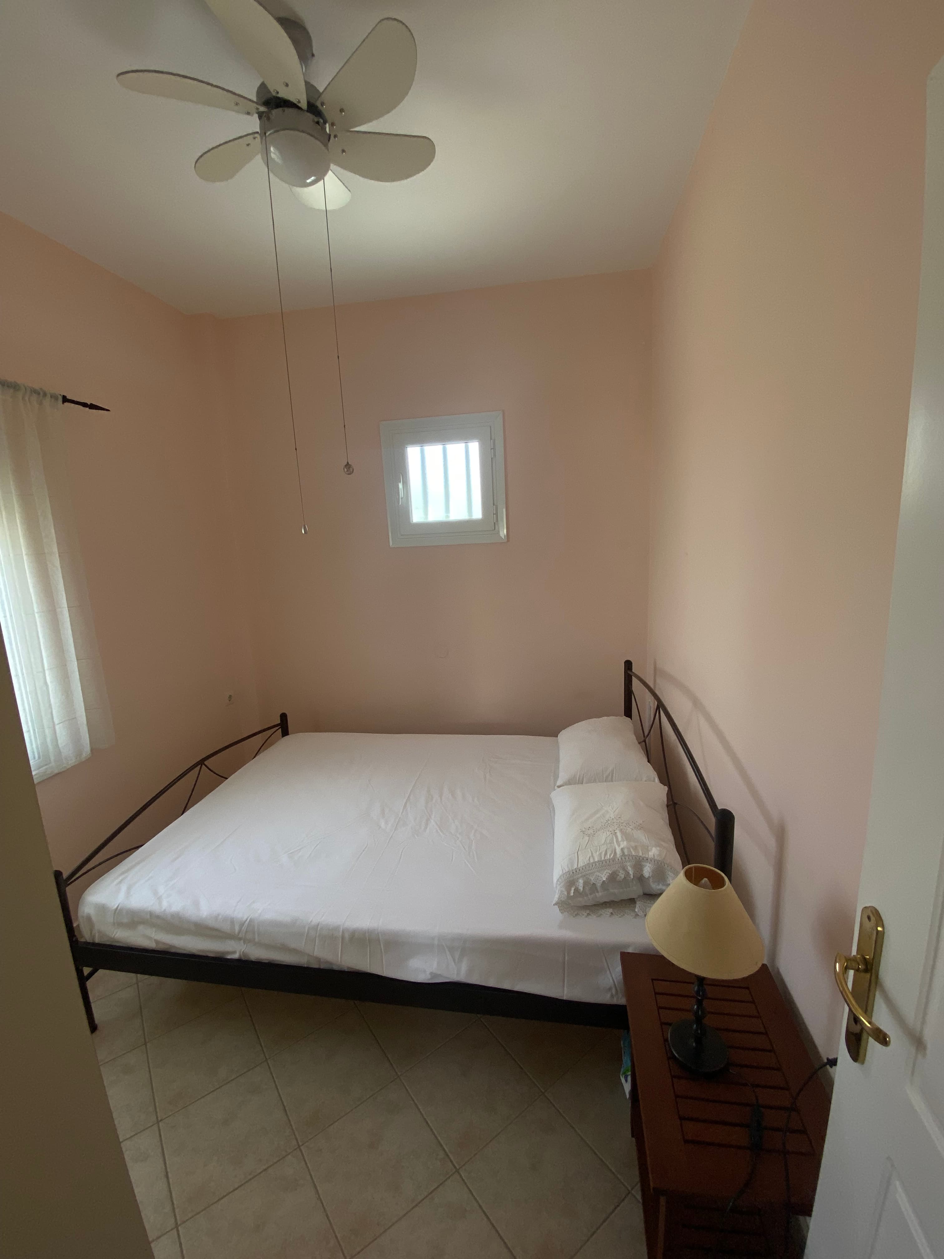 Bedroom with Bed and Ceiling Fan